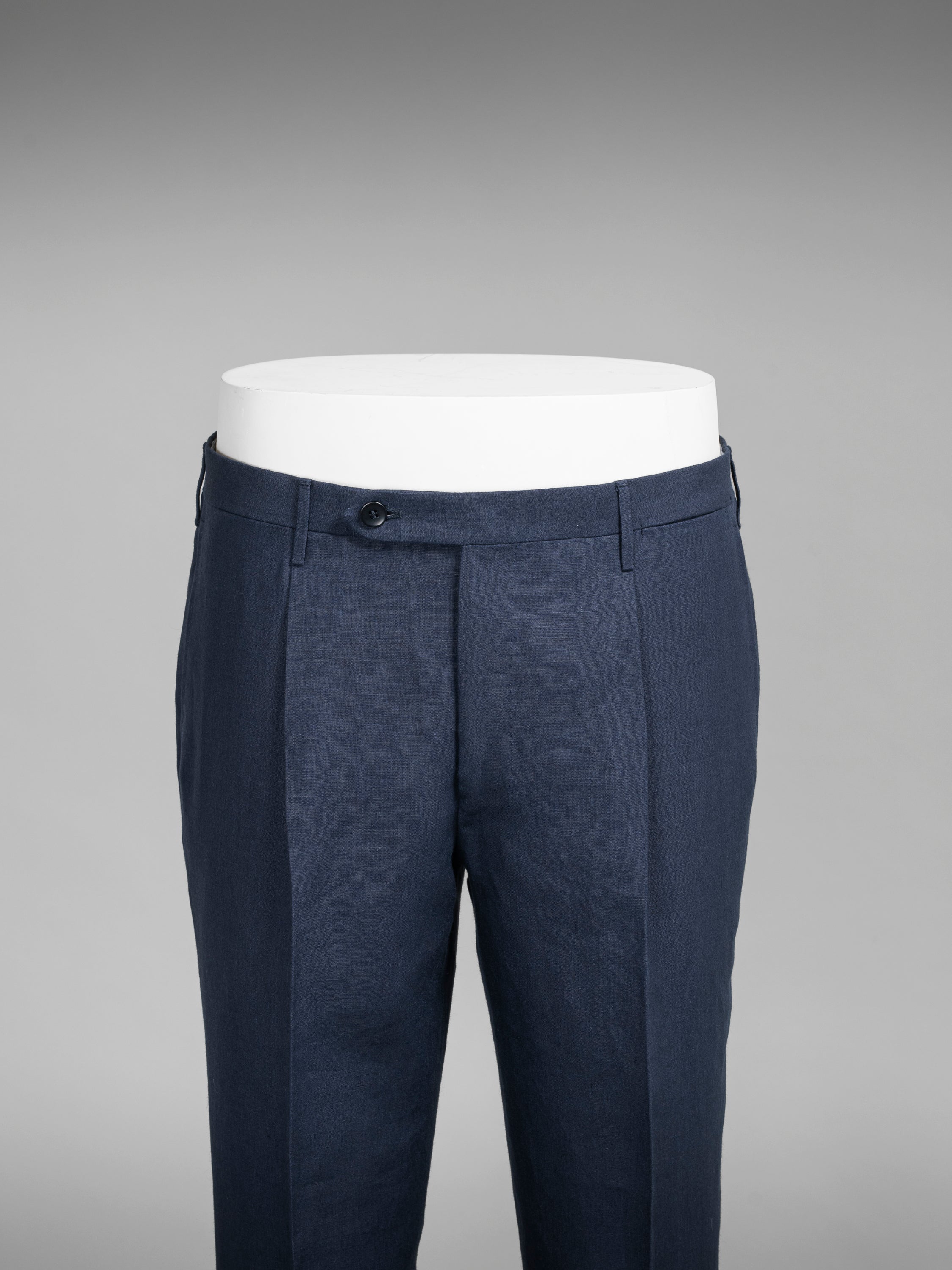 Dark blue pair of regular fit linen trousers